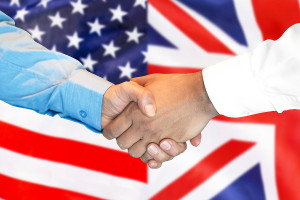 UK and USA flag handshake