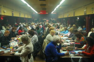 busy bingo hall with cigarette smoke