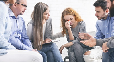 support group people sat together