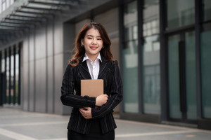 Manager holding a folder